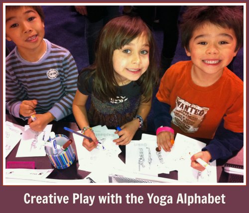 3 children engaged in creative play with the yoga alphabet cards