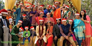 Christmas Day with the entire wedding party of 30 people posing with Santa Hats in Pune Indian