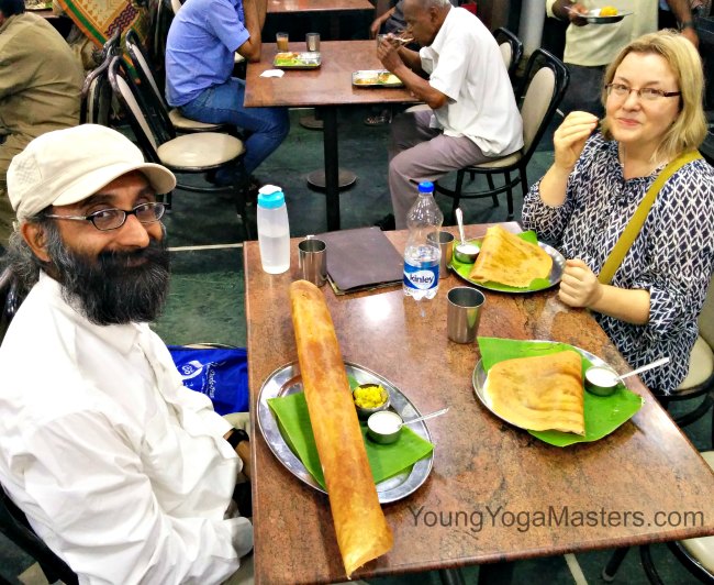 yoga retreat eating dosa in Mysore India